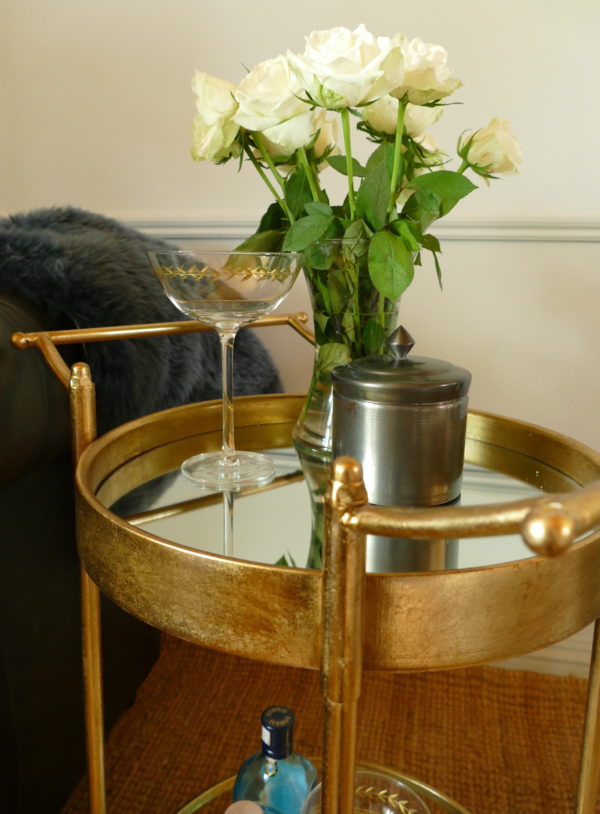 gold drinks trolley and martini glass
