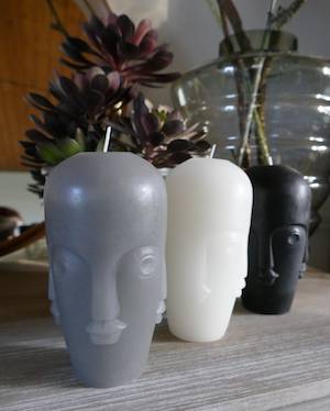 ABSTRACT FACE CANDLES S3 ON TABLE